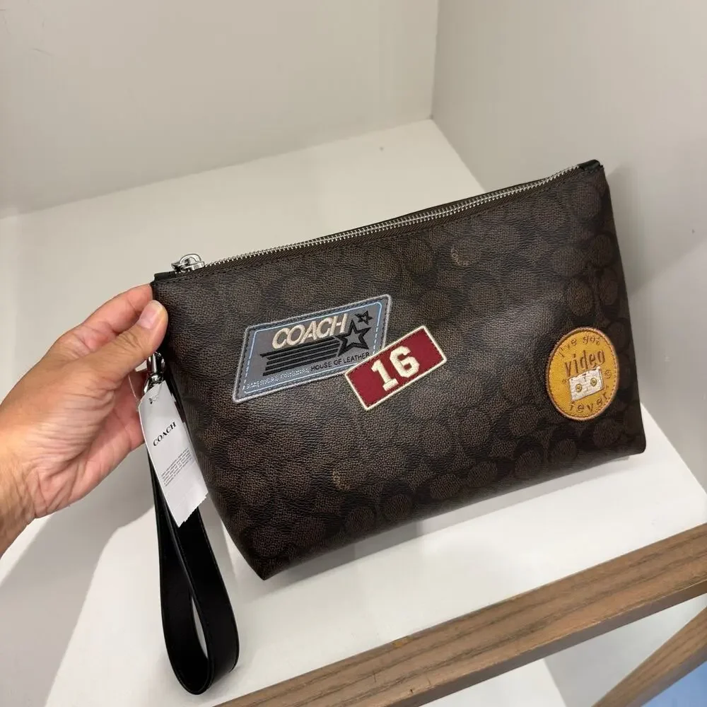 NEW‼️Coach Pouch In Signature Canvas With Patches CFR91 Walnut/Black